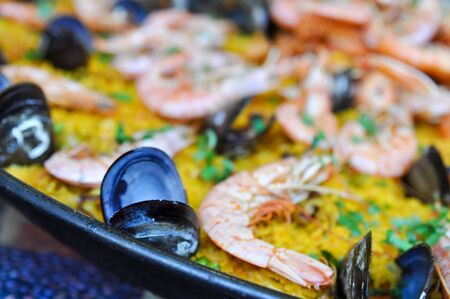 Spanish Paella Close Up with Shrimp and Clamsの写真素材