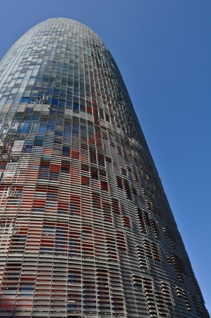 BARCELONA, SPAIN - JULY 26: Torre Agbar, Iconic business tower in Barcelona at July 26, 2010. The tower was officially opened by the King of Spain on September 16, 2005 and at a cost of 130 million euros.のeditorial素材