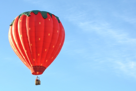 RENO, NEVADA USA - SEPTEMBER 08: The Great Reno Balloon Race on September 08 2012, in Reno Nevada. The Strawberry Heights balloon was featured in the 2012 race.のeditorial素材