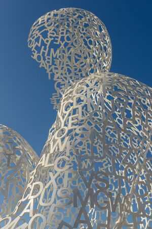 ANTIBES, FRANCE - JULY 15: The Nomade sculpture in the port of Antibe on July 15, 2012. The sculpture is by Jaume Plensa and uses light, sound, and language to express its message.のeditorial素材