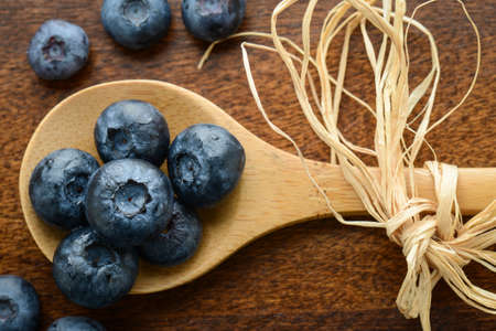 Blueberries on a Wooden Spoonの写真素材