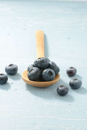 Blueberries on a Wooden Spoonの写真素材