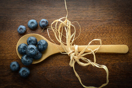 Blueberries on a Wooden Spoonの写真素材