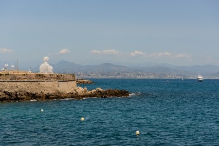 ANTIBES - JULY 15: The Nomade sculpture in the port of Antibes, on July 15, 2012 in France. The sculpture is by Jaume Plensa and uses light, sound, and language to express its message.のeditorial素材