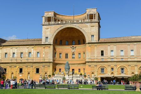 ROME, ITALY - OCTOBER 18 2014: Tourists at the Fontana Della Pigna or famous Pine cone at Vatican City in Romeのeditorial素材