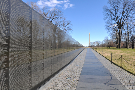 WASHINGTON DC -JANUARY 18: Names on Vietnam War Veterans Memorial on July 18, 2010 in Washington DC, USA.  The memorial receives around 3 million visitors each year.のeditorial素材