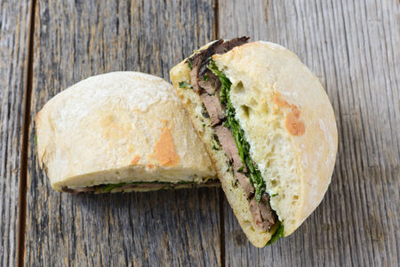 Beef Steak Sandwich on Rustic Backgroundの写真素材