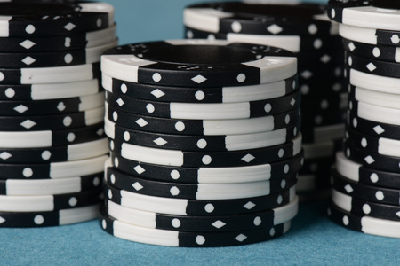 Stacked Black and White Poker Chipsの写真素材