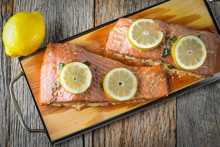 Grilled Salmon cooked on a Cedar Plankの写真素材