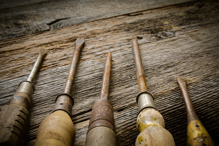 Rustic Screwdrivers on Wood Backgroundの写真素材