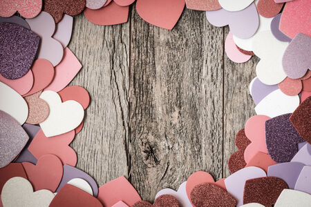 Valentine's Day Hearts on Rustic Wooden Background