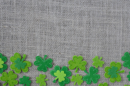 Green Clover on Burlap Backgroundの写真素材