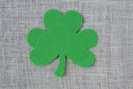 Green Clover on Burlap Backgroundの写真素材
