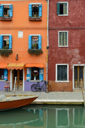 BURANO, ITALY - October 23: Canal with colorful houses on the famous island Burano, Venice on October 23, 2014 in Burano. のeditorial素材