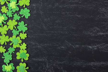 Green Clover on Chalkboard Background Background for St. Patrick's Day Holidayの写真素材
