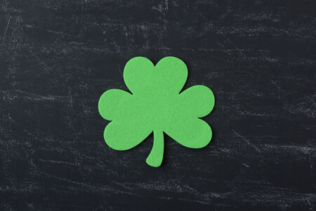 Green Clover on Chalkboard Background Background for St. Patrick's Day Holidayの写真素材