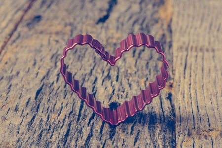 Heart on Vintage Wood Background for Valentine's Dayの写真素材