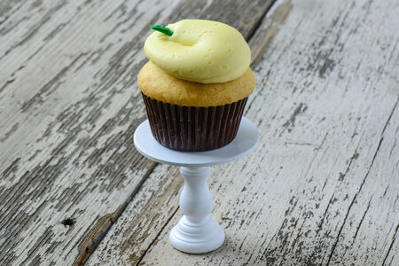 Lemon Cupcake on a Cupcake Standの写真素材