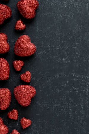 Red Hearts on a Chalkboard for Valentines Dayの写真素材