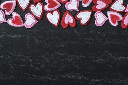 Red Hearts on a Chalkboard for Valentines Dayの写真素材