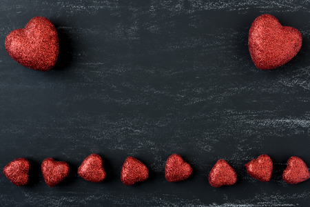 Red Hearts on a Chalkboard for Valentines Dayの写真素材