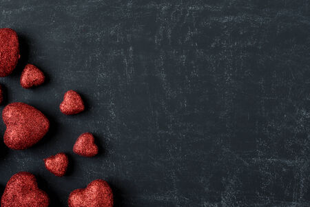 Red Hearts on a Chalkboard for Valentines Dayの写真素材