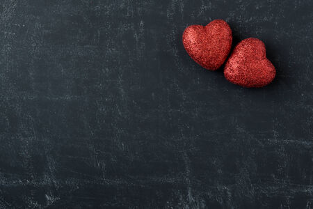 Red Hearts on a Chalkboard for Valentines Dayの写真素材