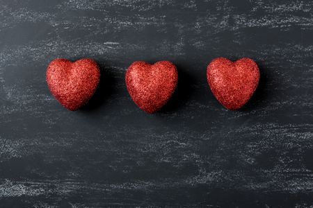 Red Hearts on a Chalkboard for Valentines Dayの写真素材