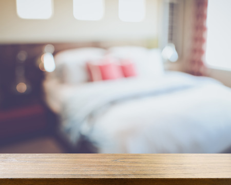 Blurred Bedroom with Bed and Nightstand with Retro Style Filterの写真素材