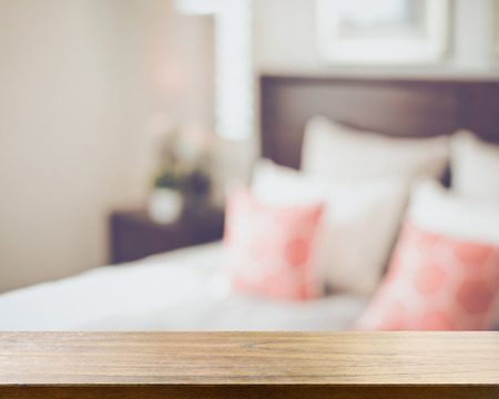 Blurred Bedroom with Bed and Nightstand with Reto Style Filter