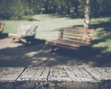 Blurred Park Bench with Nature Backgroundの写真素材