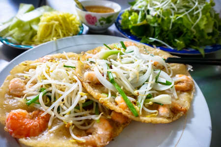 Traditional pancake with bean sprout, shrimps and green onionの写真素材