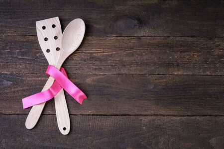 Wooden kitchenware on the tableの写真素材