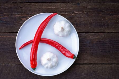 Plate with pepper and garlicの写真素材