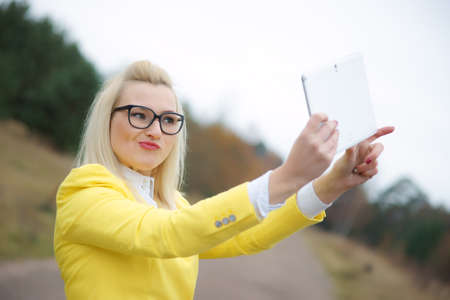 Young woman with digital tabletの写真素材