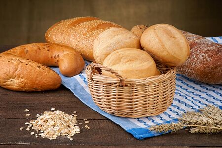 Basket with bread products and oat groatsの写真素材