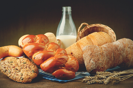 Bottle of milk and baked breadの写真素材