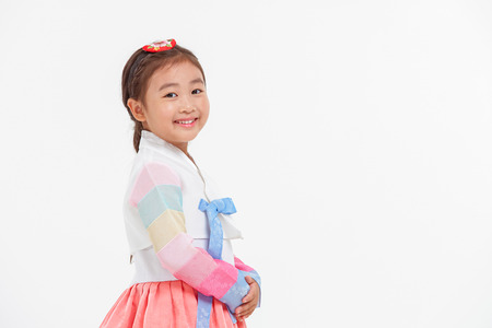 Portrait of Asian Three Generation Family in Hanbok, Korean Traditional Clothesの写真素材