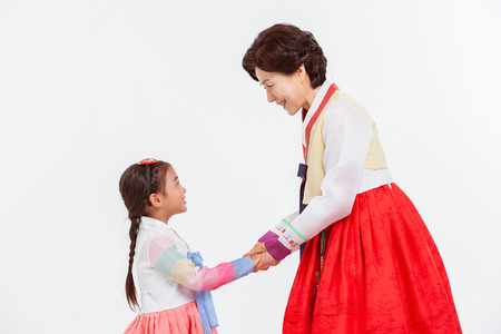Portrait of Asian Three Generation Family in Hanbok, Korean Traditional Clothesの写真素材