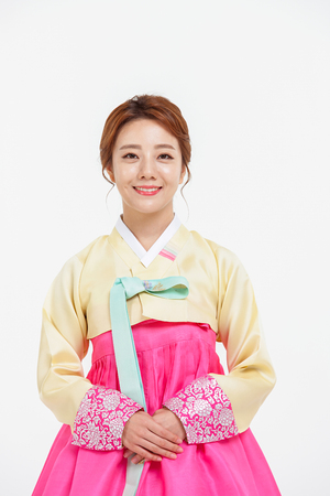 Portrait of Asian Three Generation Family in Hanbok, Korean Traditional Clothesの写真素材