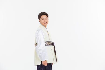 Portrait of Asian Three Generation Family in Hanbok, Korean Traditional Clothesの写真素材