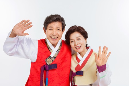 Portrait of Asian Three Generation Family in Hanbok, Korean Traditional Clothesの写真素材