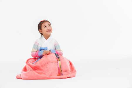 Portrait of Asian Three Generation Family in Hanbok, Korean Traditional Clothesの写真素材