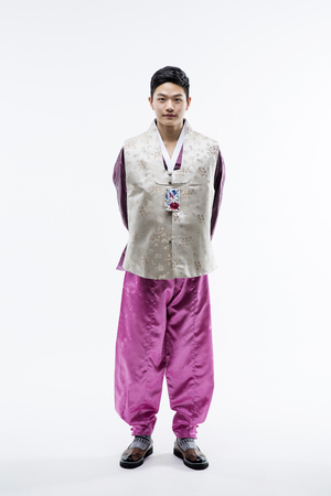 Portrait of Young Asian Couple in Korean Traditional Clothes, Hanbokの写真素材