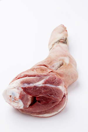 Fresh pig feet, isolated on whiteの写真素材