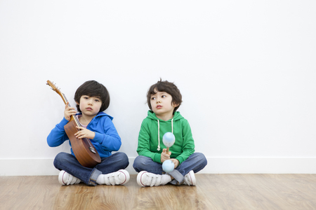 A child playing with a friendの写真素材