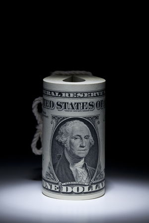 Money presented in a dark settingの写真素材