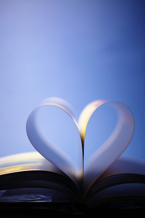 Heart shape made from pages of a bookの写真素材