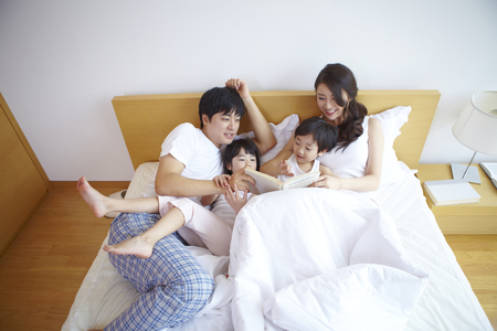 Asian Family Comfortable At Homeの写真素材