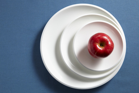 An Apple On A Plate Stackの写真素材